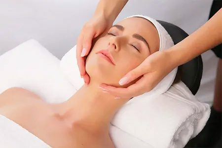 Woman undergoing medifacial treatment