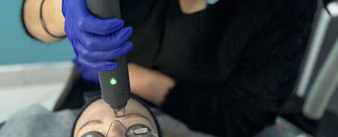 Woman undergoing hollywood laser facial treatment