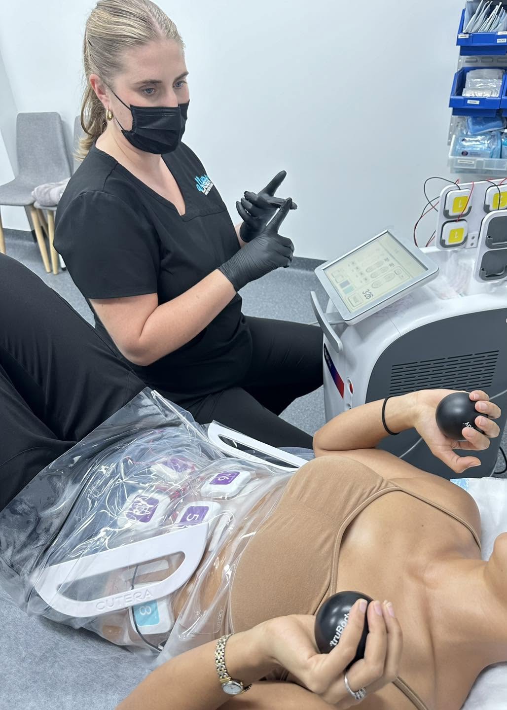 Woman receiving a body sculpt treatment