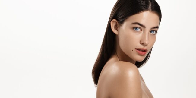 Woman maintaining her glowing skin