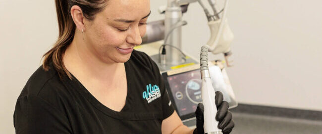 Nurse doing radiofrequency skin needling to a patient