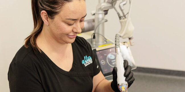 Nurse doing radiofrequency skin needling to a patient