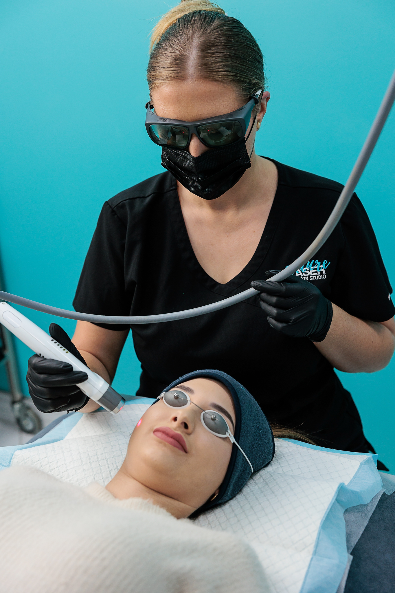 Woman undergoing laser skin rejuvenation