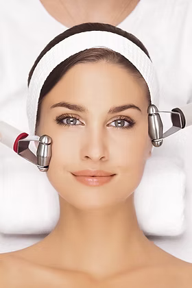 Woman undergoing facial thread treatment